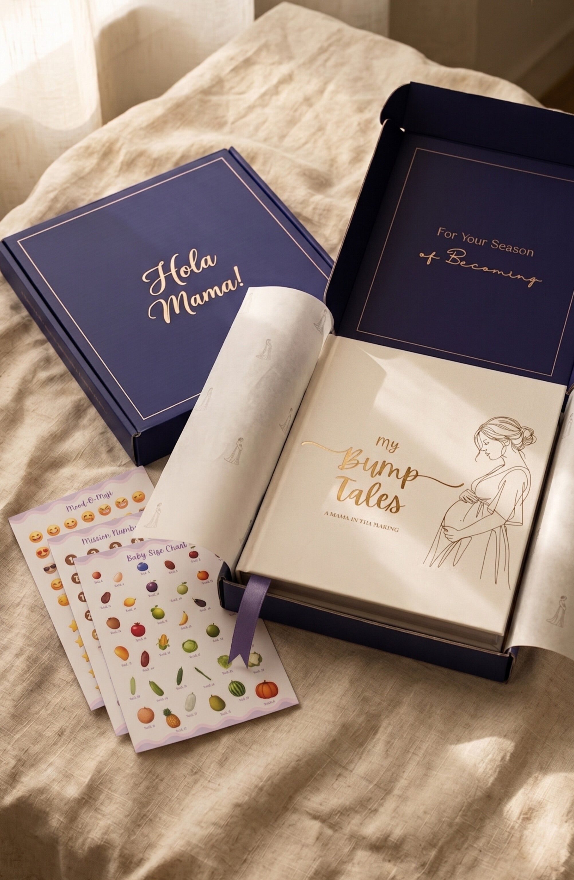 My Bump Tales full kit — journal, sticker sheets, and navy gift box with gold foil detailing